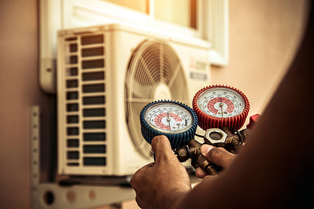 Professional Heat Pump Repair technician working in Strykersville, NY
